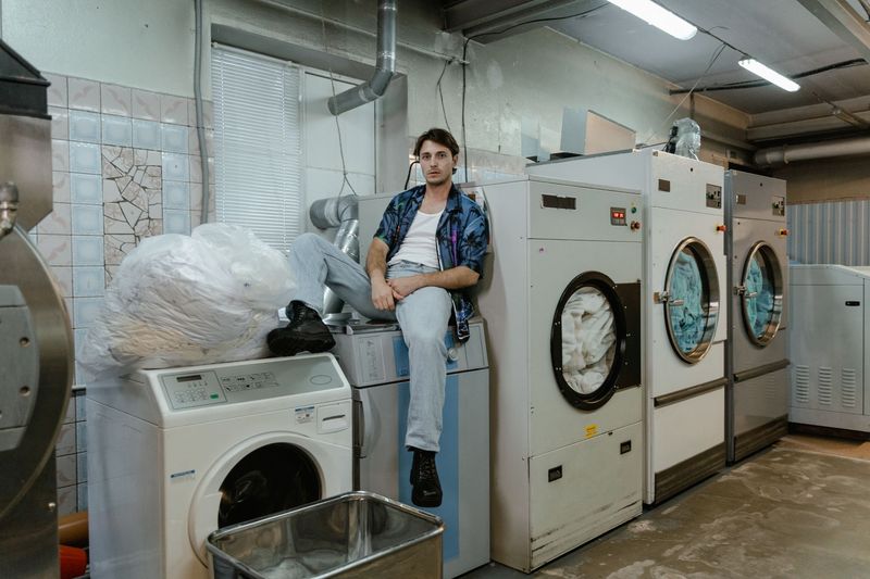 Laundry baskets filled with neatly folded shirts for a household routine