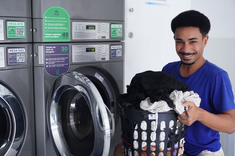 Clothes Call team member carefully folding clean laundry in Titusville, Florida